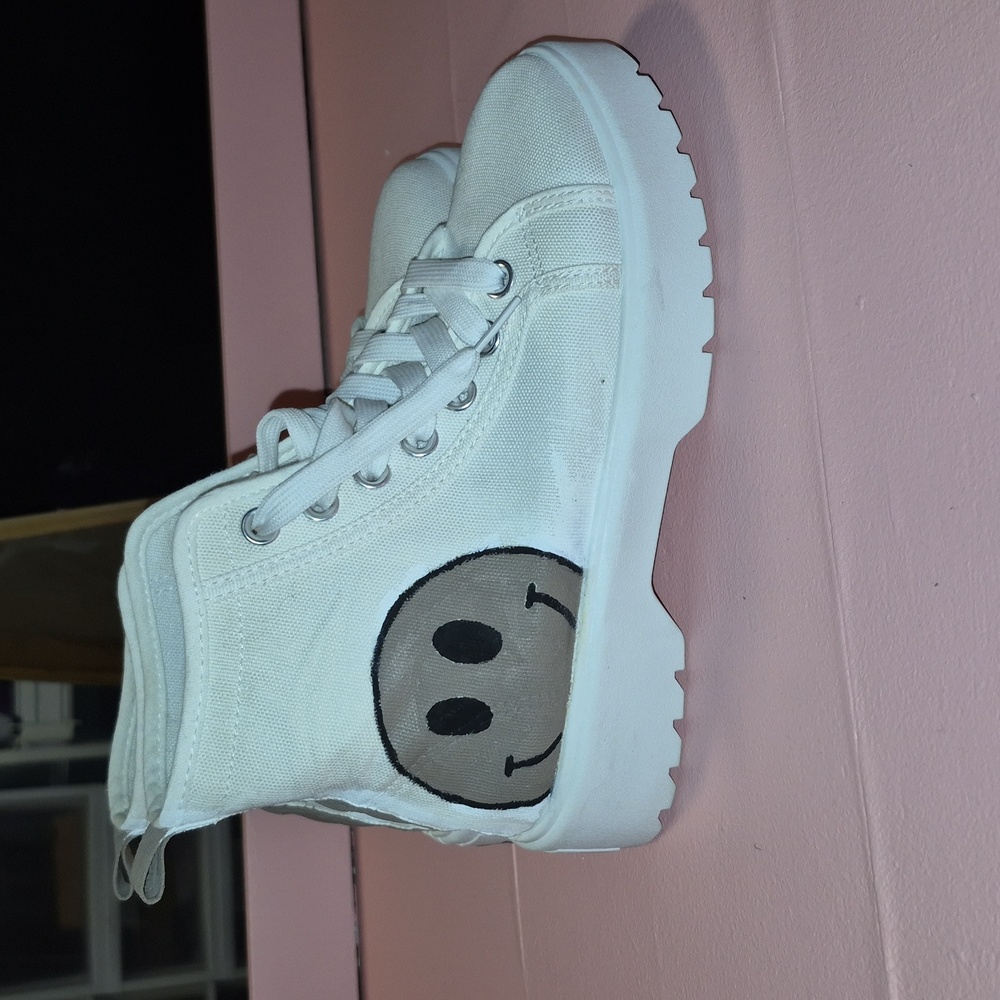 Canvas shoes with custom smiley face design